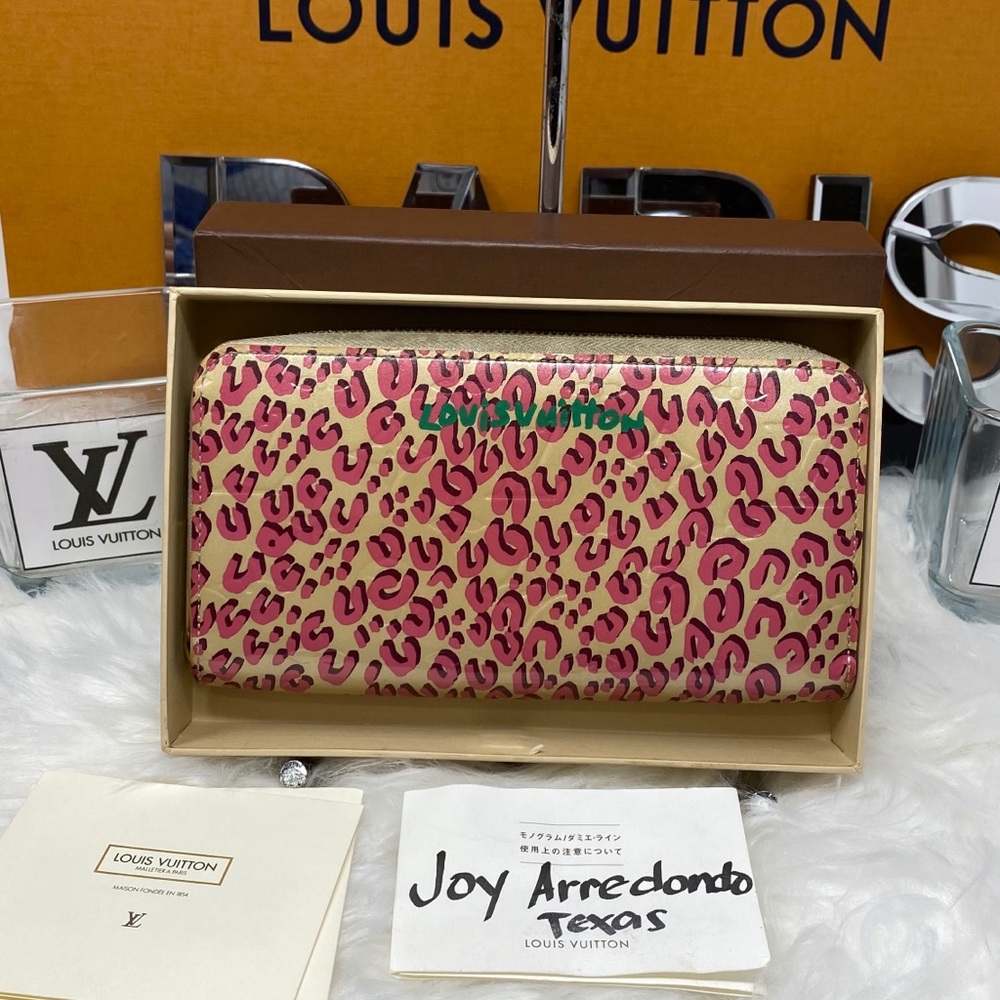 Authentic Louis Vuitton Pink leopard zippy wallet